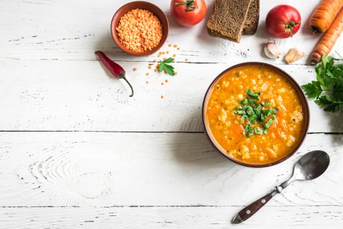 Red,Lentil,Soup,On,White,Wooden,Background,,Top,View,,Copy